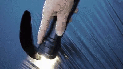 "100000 lumen tactical flashlight with LED, sturdy black aluminum body, LCD power display, ideal for outdoor use."