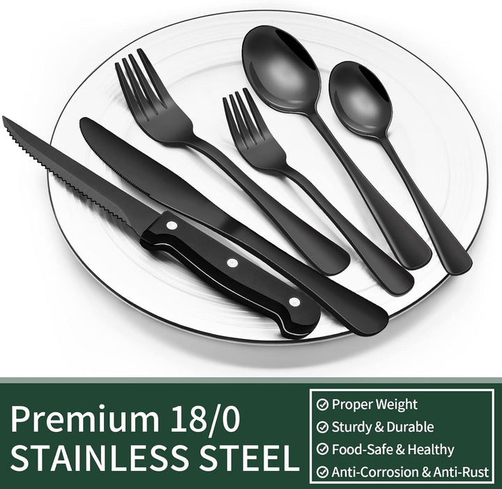 Complete 24-piece black stainless steel flatware set, including forks, spoons, and steak knives for 4.