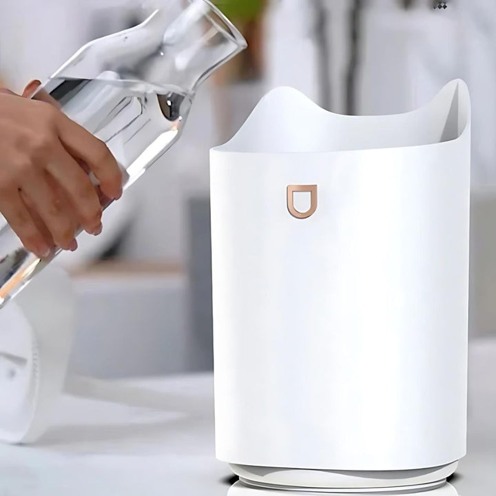 "3000ml ultrasonic humidifier with mist technology in sleek pink design, improves air quality, alleviates respiratory issues.