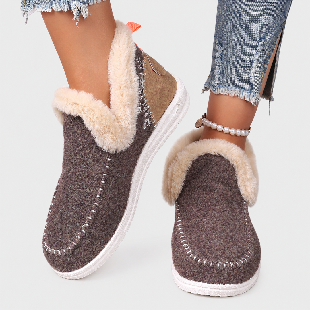 Premium women's comfort house slippers with a soft plush finish & supportive orthopedic design.