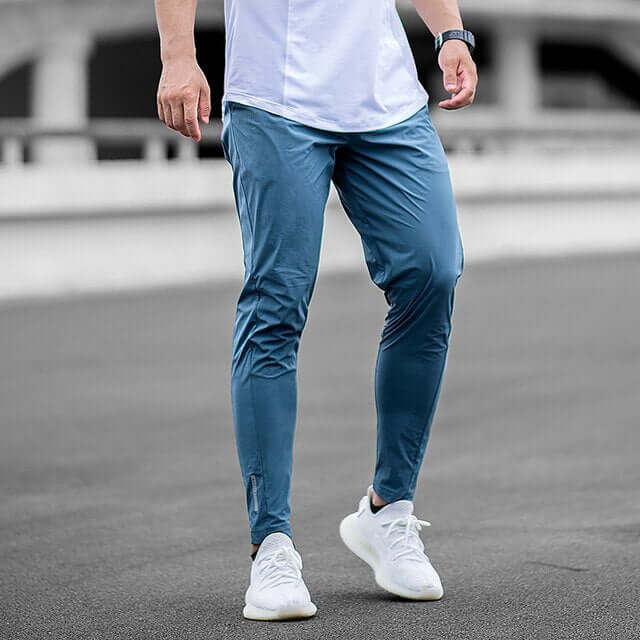 Men's tapered joggers in turquoise blue
