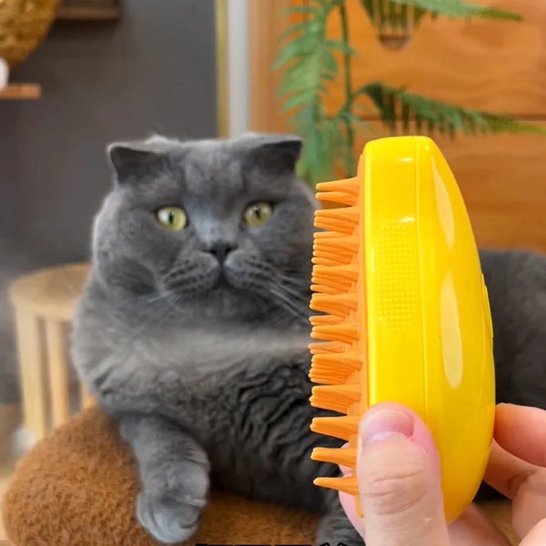 Ergonomic Pet 3-in-1 Steam Cat Brush for grooming, de-shedding & fur removal. Essential cat care tool.