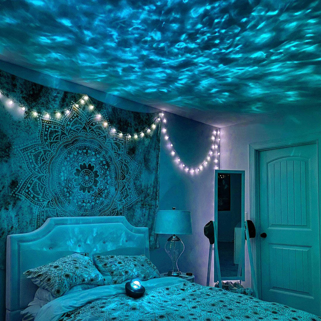 Galaxy Projector transforming a bedroom into a star-filled celestial night light.
