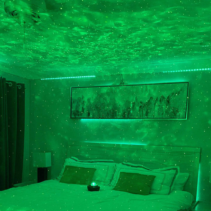 Vibrant Star Light Projector displaying colorful galaxies and nebulae on a ceiling.