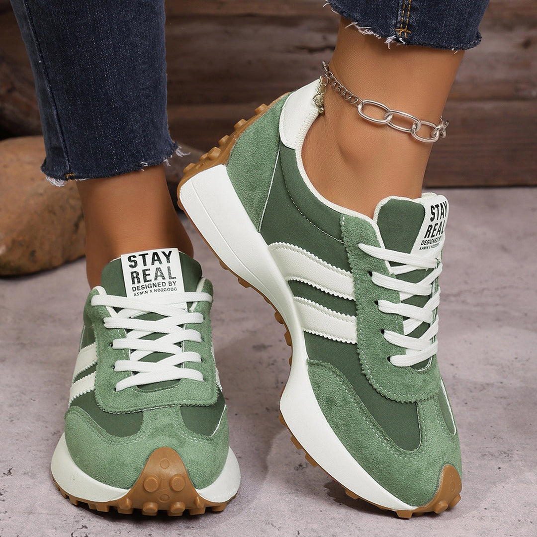 Lightweight women's walking shoes with orthopedic arch support.
