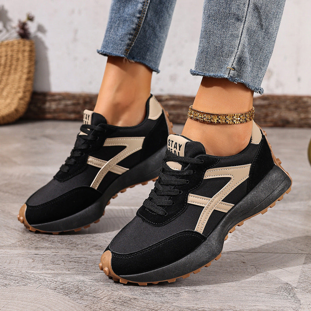 Slip-resistant women's wide fit sneakers, designed for comfort & safety.