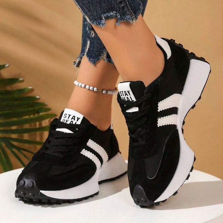 Everyday women's wide fit sneakers, offering superior comfort & stability.