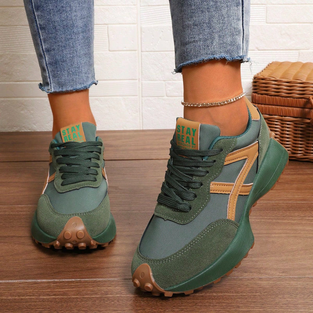 Flexible women's orthopedic sneakers with slip-resistant sole.