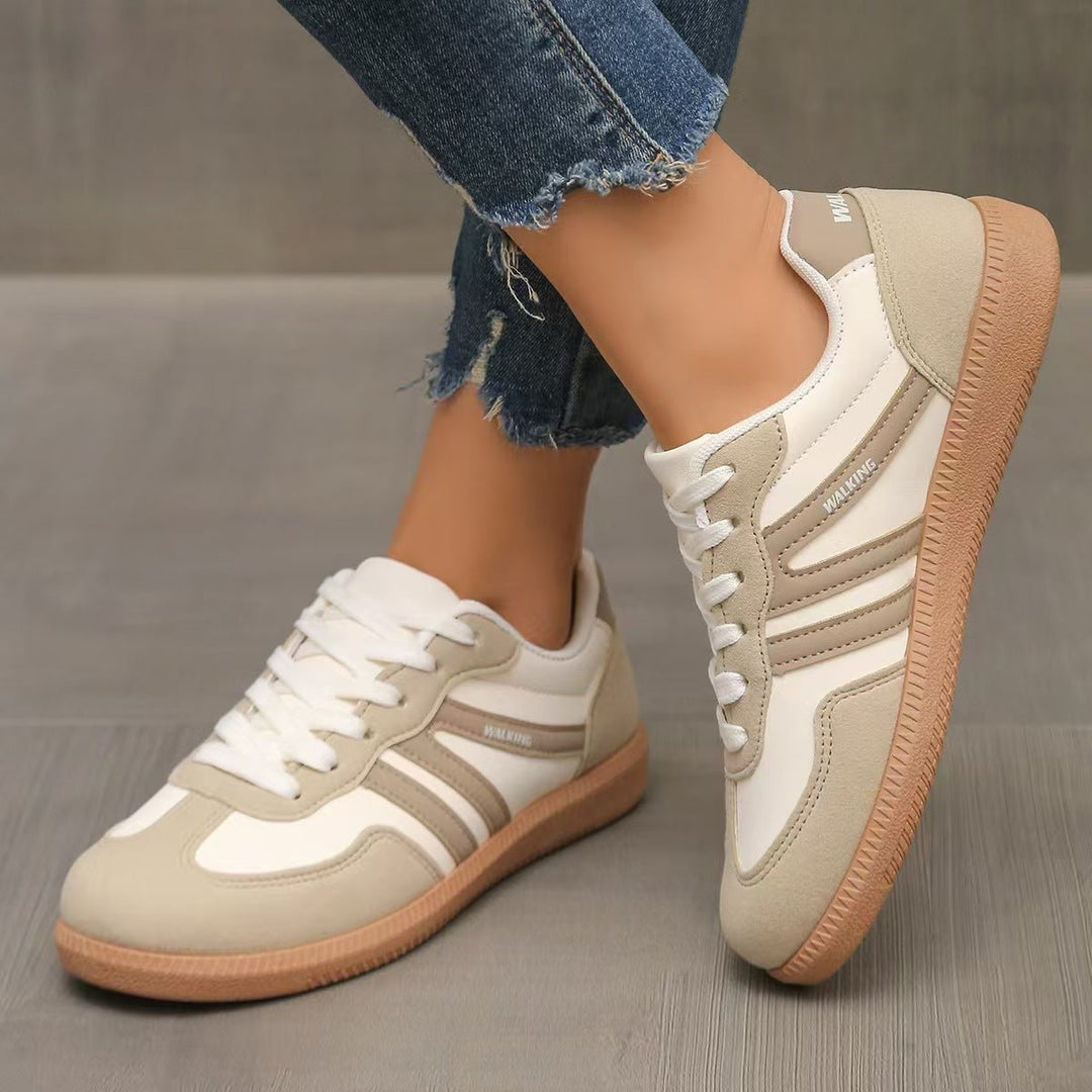 Cushioned women's wide fit sneakers, perfect for walking & all-day support.