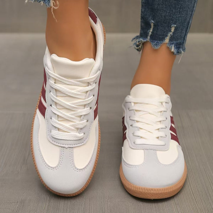 Lace-up women's wide fit sneakers, orthopedic arch support for active women.