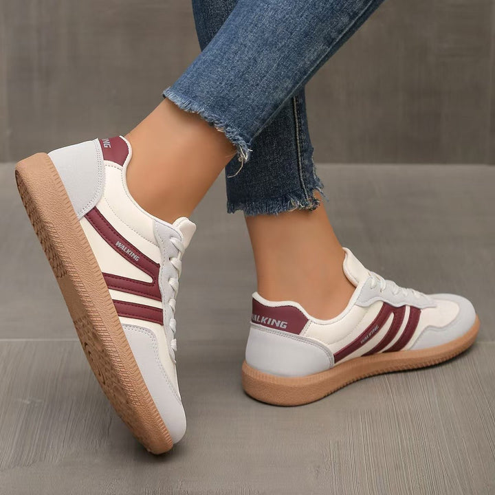 Supportive women's orthopedic trainers, wide fit, cushioned for comfort.