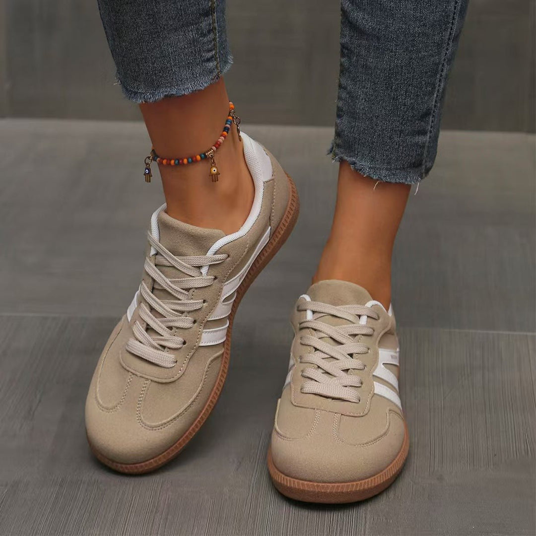 Comfortable women's wide fit trainers with arch support for long walks.