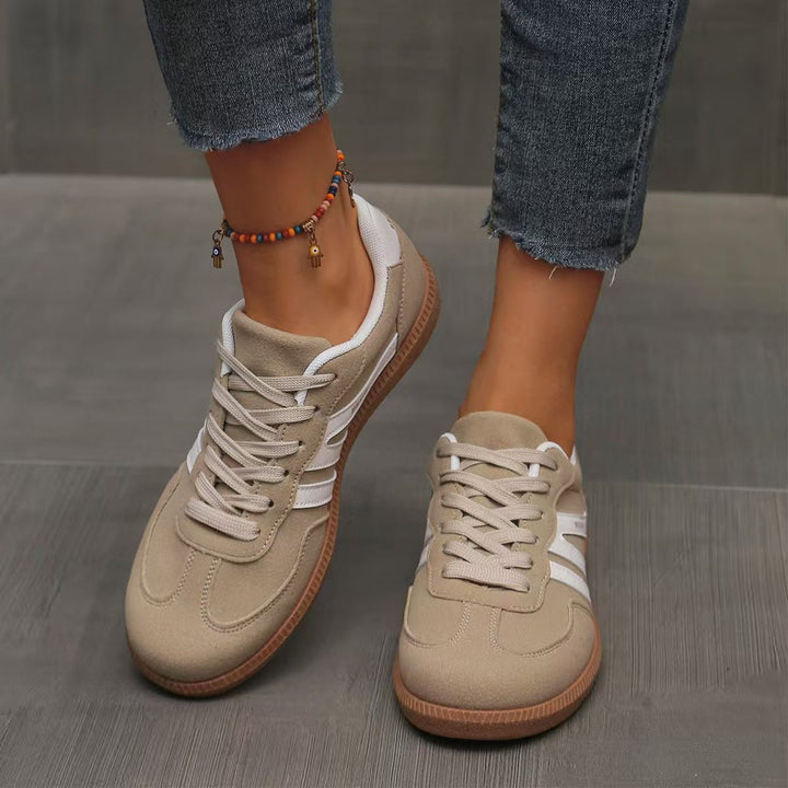Comfortable women's wide fit trainers with arch support for long walks.