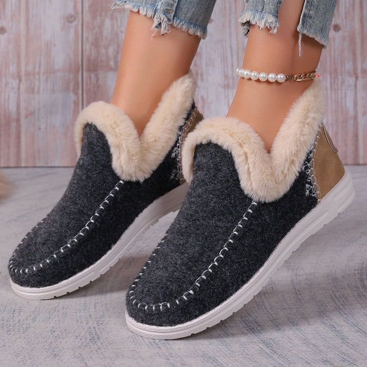 Women's foot support slippers, warm, plush, and orthopedic, ideal for indoor relaxation.