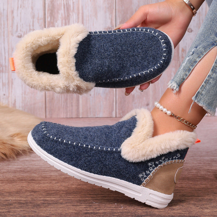 Stylish women's orthopedic plush slip-on slippers, perfect for at-home comfort.