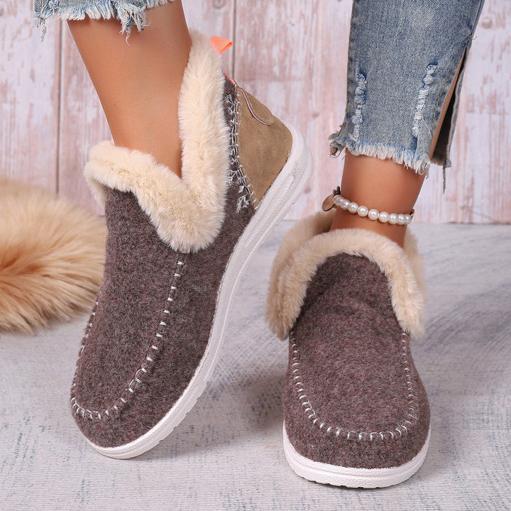 Durable women's orthopedic warm slippers, offering plush comfort and excellent foot support.