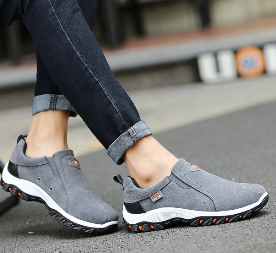Men's casual comfort footwear with orthopedic features for daily walking and support.