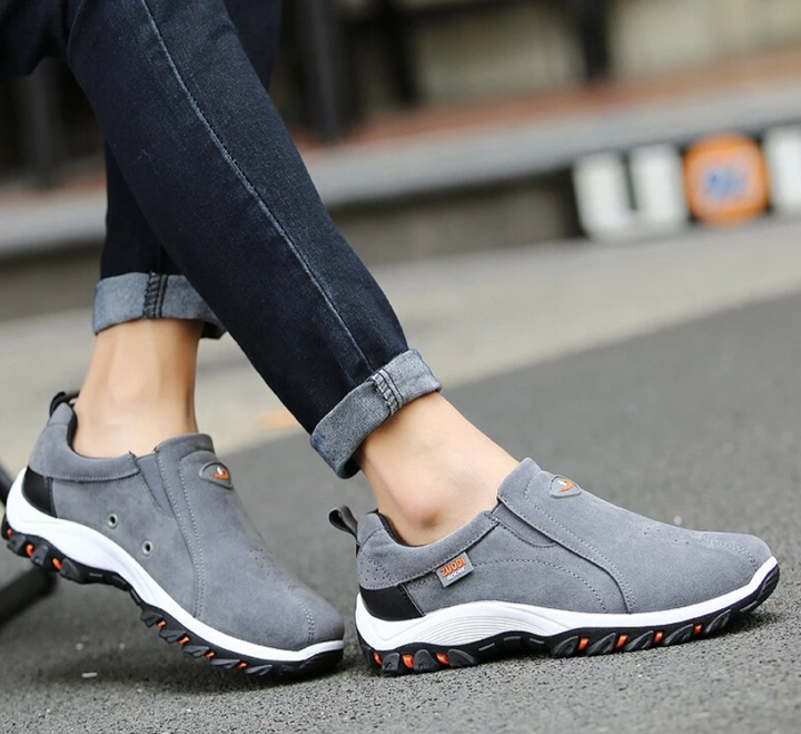 Men's casual comfort footwear with orthopedic features for daily walking and support.