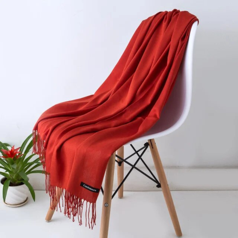 Oversized cashmere blend women's wrap, soft and luxurious for winter comfort.