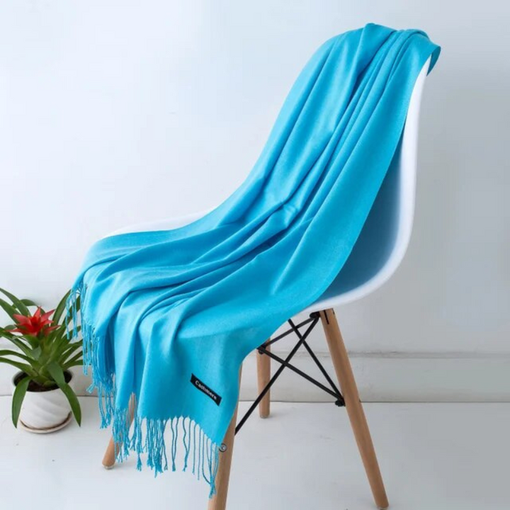Luxurious women's fall wrap, cashmere blend, adds a touch of elegance.