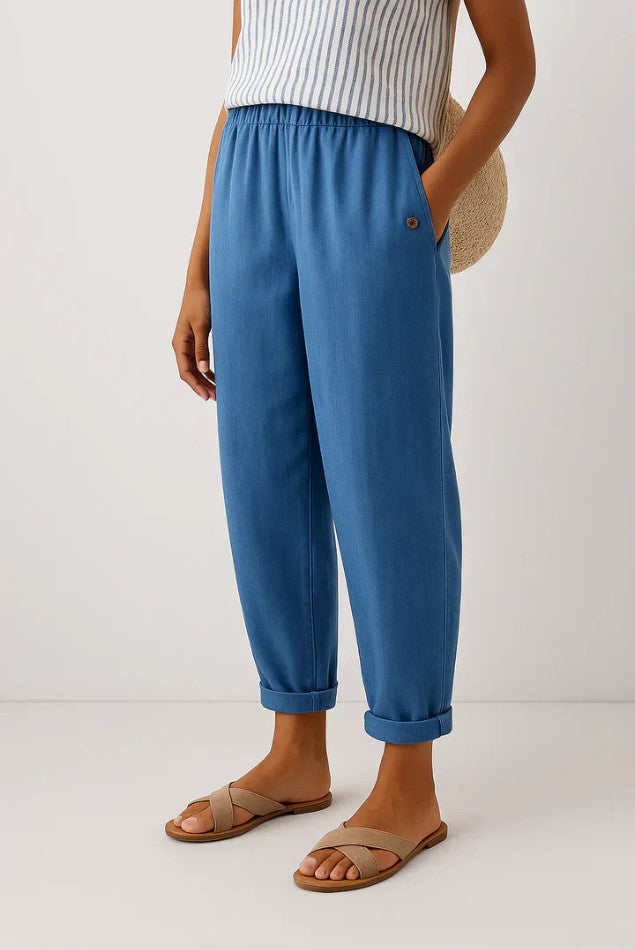 Comfortable women's everyday summer trousers; breathable fabric, elastic waist for relaxed fit.