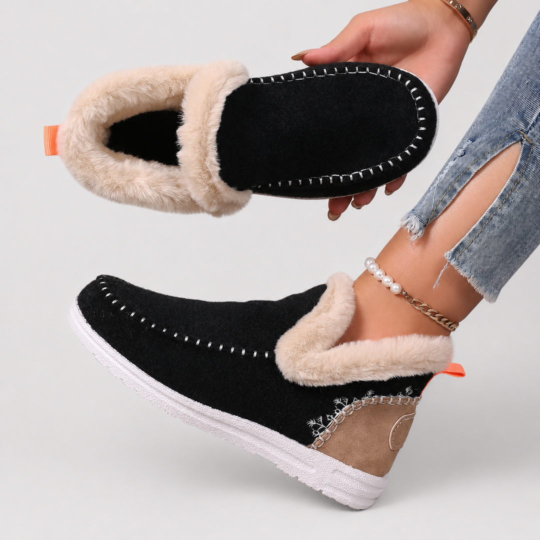 Soft women's warm slippers, offering orthopedic foot support and a cozy plush feel.