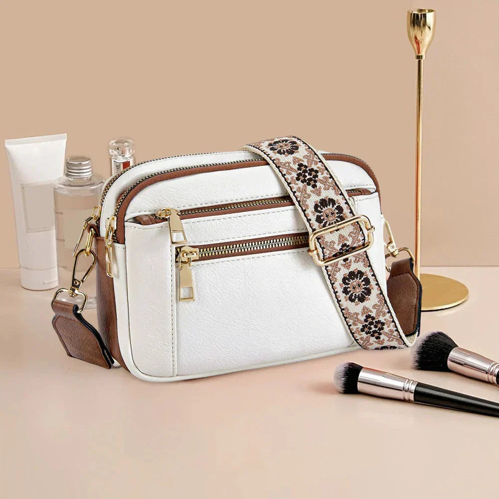 Stylish adjustable handbag shoulder strap. Durable purse accessory, perfect for comfortable crossbody wear.