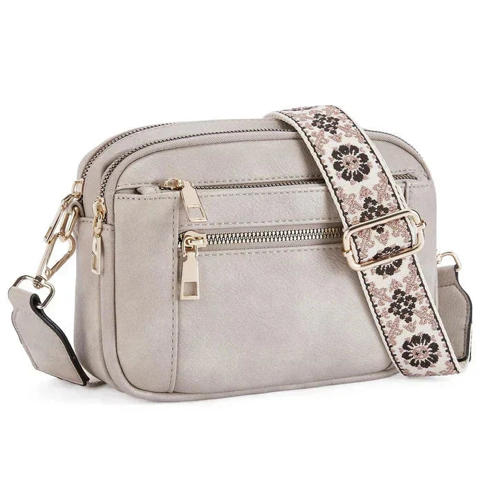 Durable adjustable handbag shoulder strap for comfortable carry. Transforms your purse into a crossbody bag.