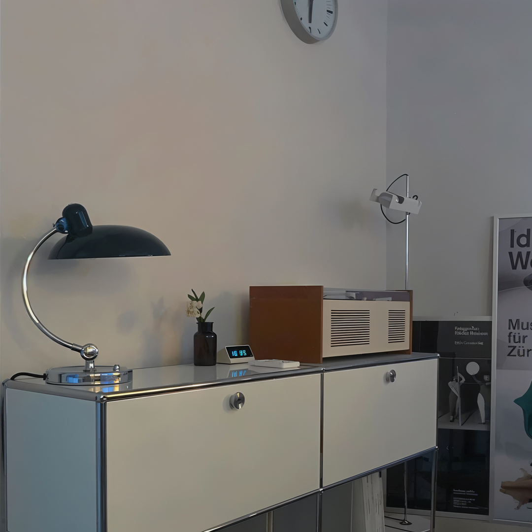Adjustable vintage industrial metal desk lamp, perfect for home office task lighting or reading.