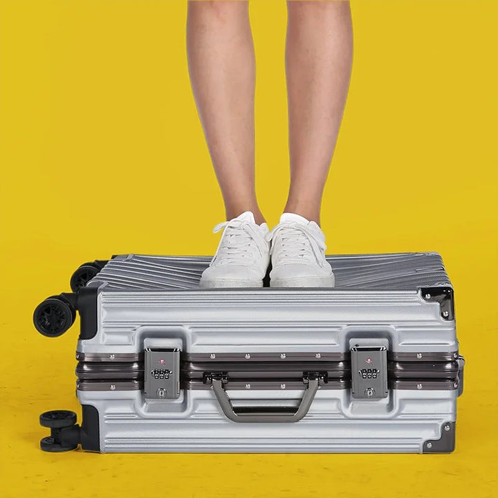 Geneva aluminium frame hard shell suitcase, offering secure travel with a strong frame and integrated lock.