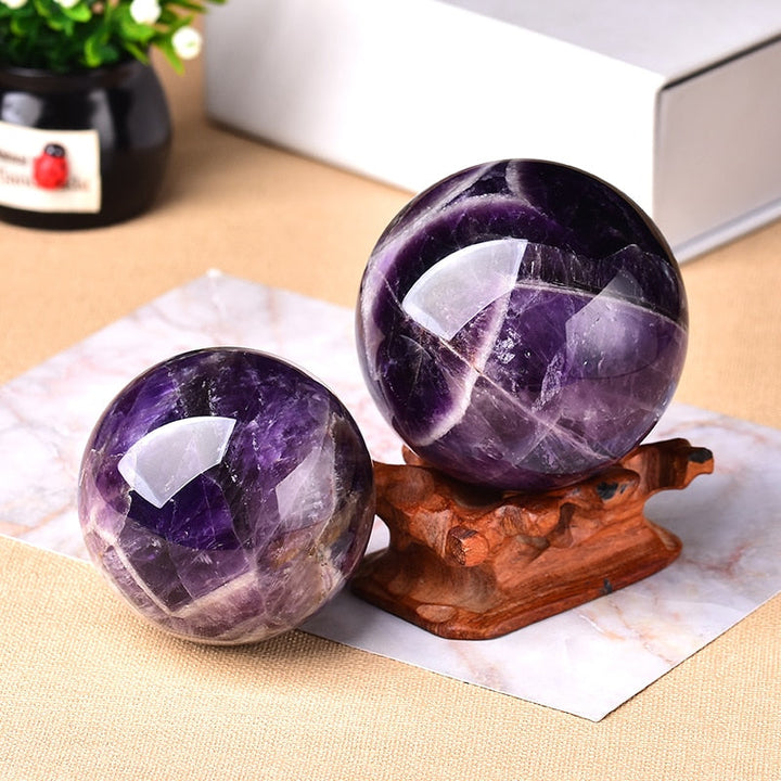 Large amethyst crystal orb, stunning purple decor accent for any room.