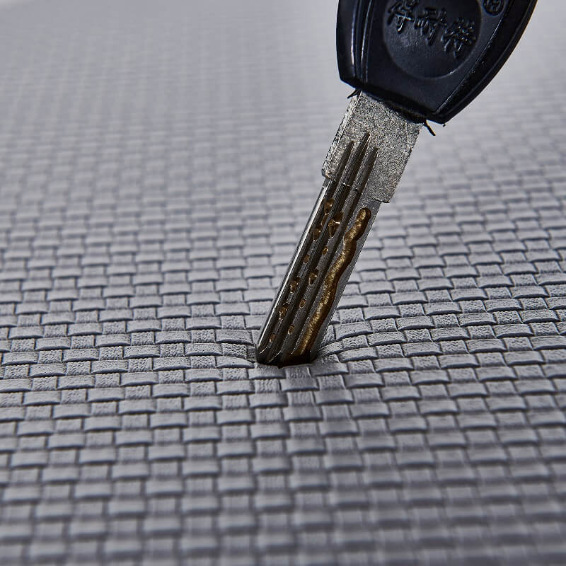 "Anti-slip waterproof kitchen rug with comfort cushioning, durable PVC, two-sided no-slip design, in grey rhombus pattern."