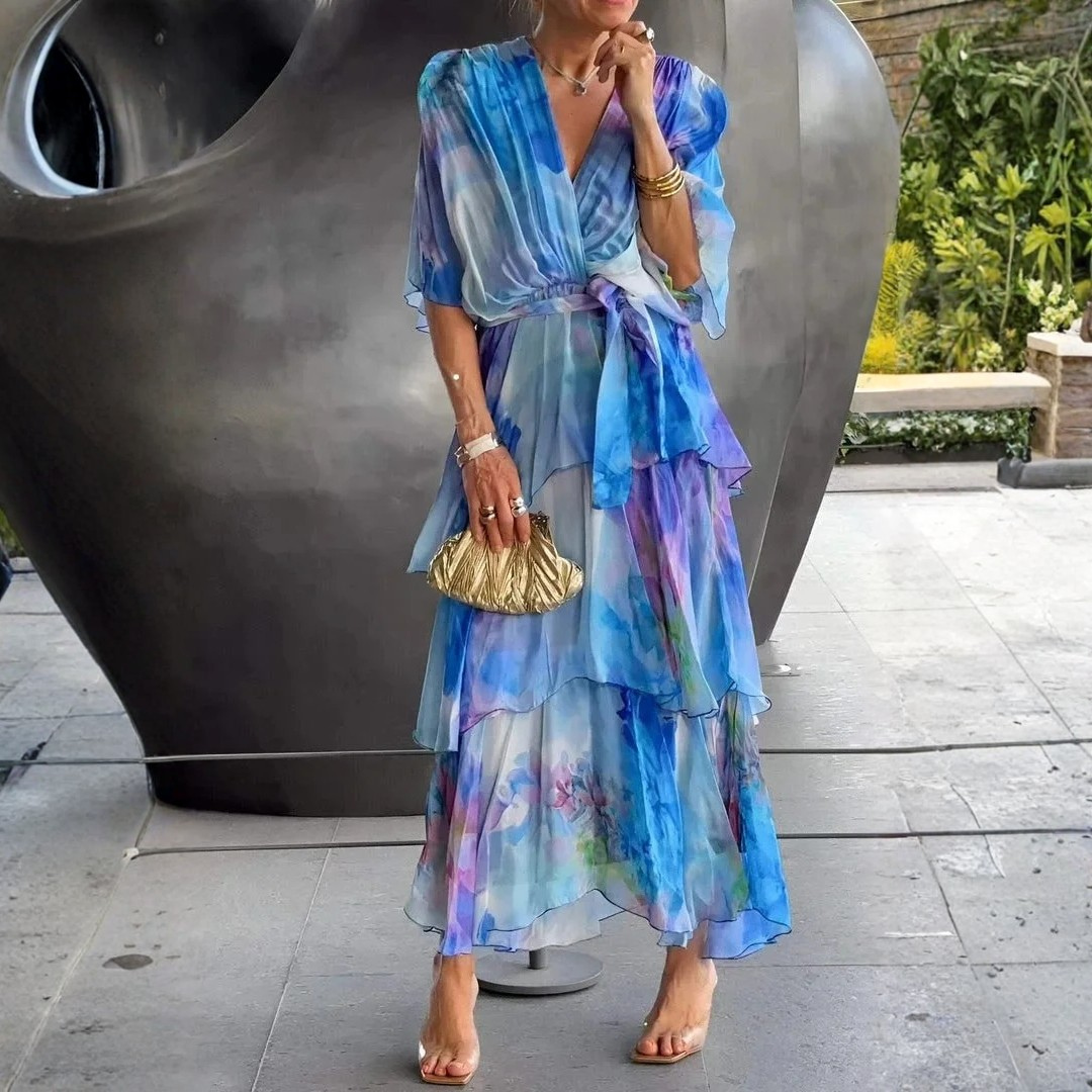 Women's elegant wrap maxi dress with tiered ruffles, V-neck, and kimono sleeves.