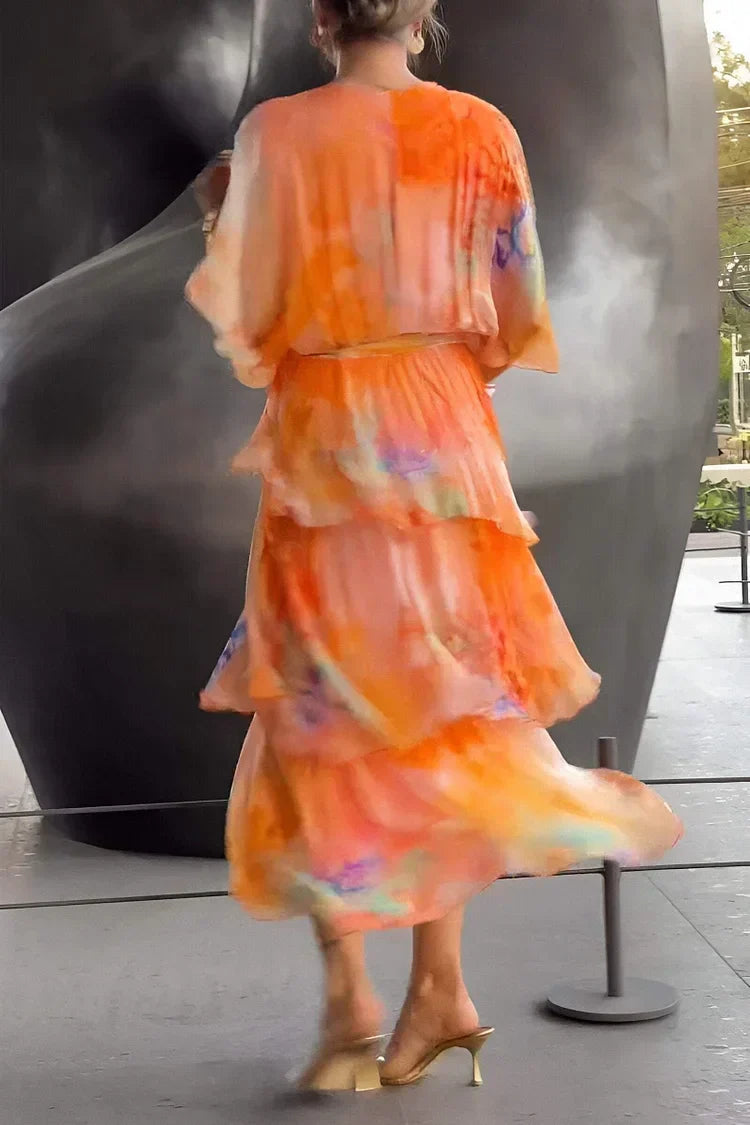 Long elegant tiered ruffle wrap maxi dress for women, ideal for formal and special occasions.