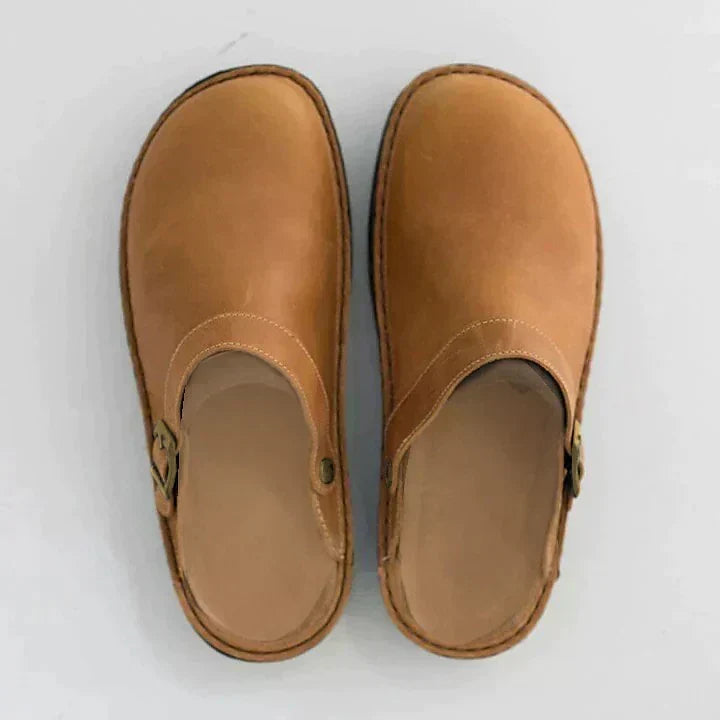 Rugged men's orthopedic clog mules, dark brown slip-on shoes with adjustable buckle for daily comfort.