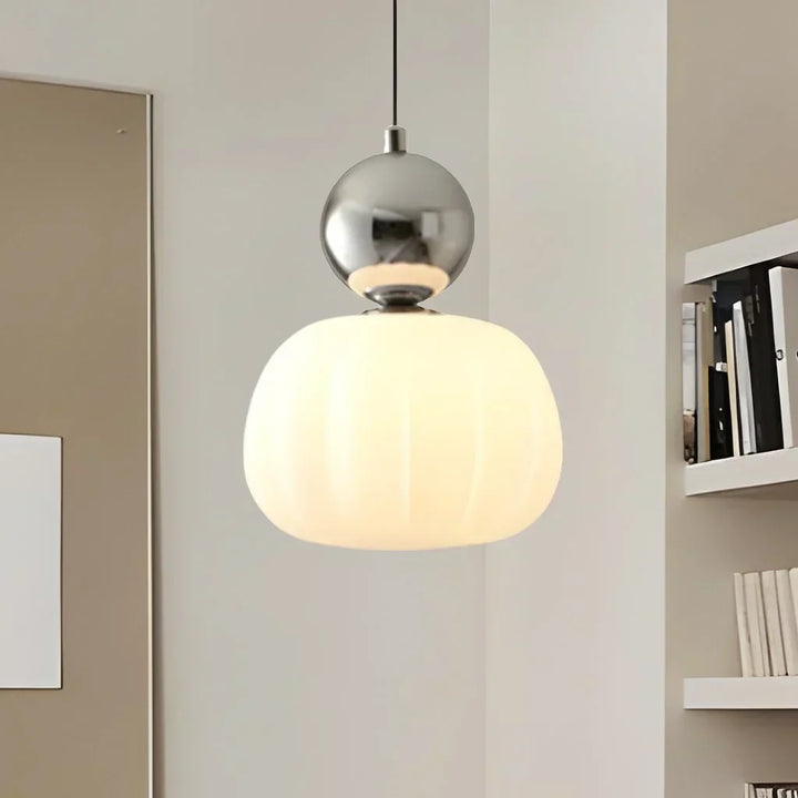 "Art Deco Cream Pendant Light with Bauhaus design, features high-quality metal frame and warm glow for elegant home lighting.