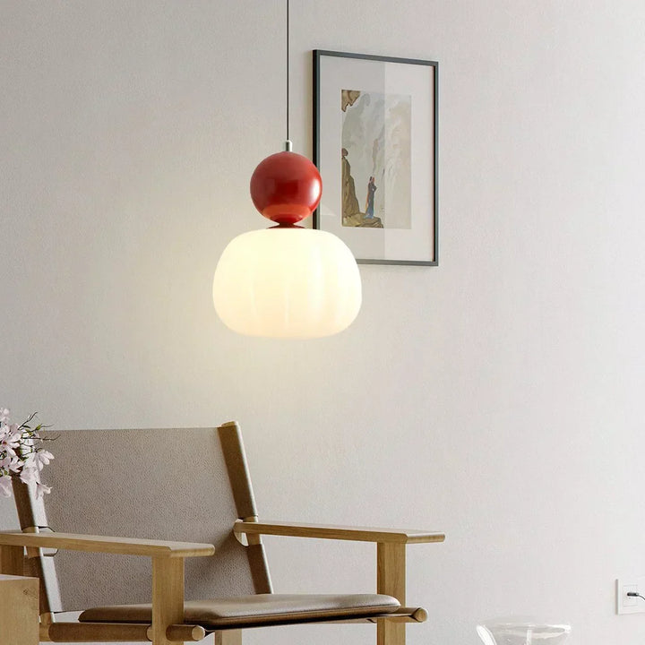 "Art Deco Cream Pendant Light with Bauhaus design, features high-quality metal frame and warm glow for elegant home lighting.
