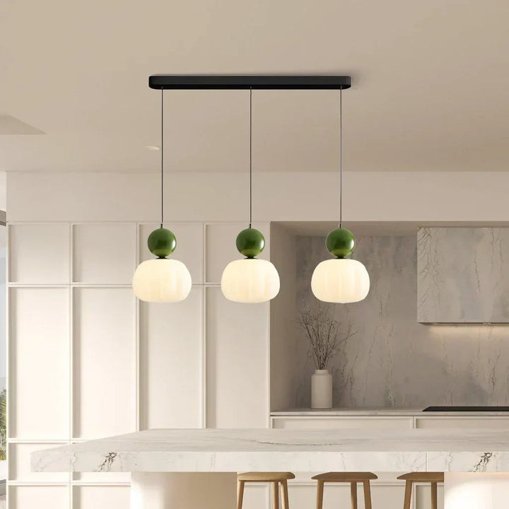 "Art Deco Cream Pendant Light with Bauhaus design, features high-quality metal frame and warm glow for elegant home lighting.
