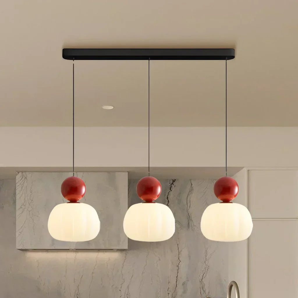 "Art Deco Cream Pendant Light with Bauhaus design, features high-quality metal frame and warm glow for elegant home lighting.