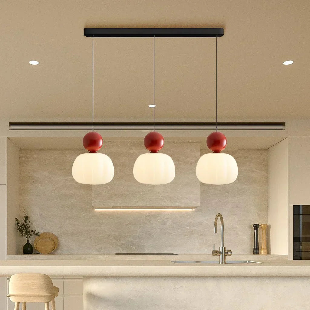 "Art Deco Cream Pendant Light with Bauhaus design, features high-quality metal frame and warm glow for elegant home lighting.