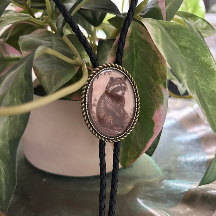 Western style bolo tie featuring a playful banjo-playing frog, a unique unisex novelty accessory.