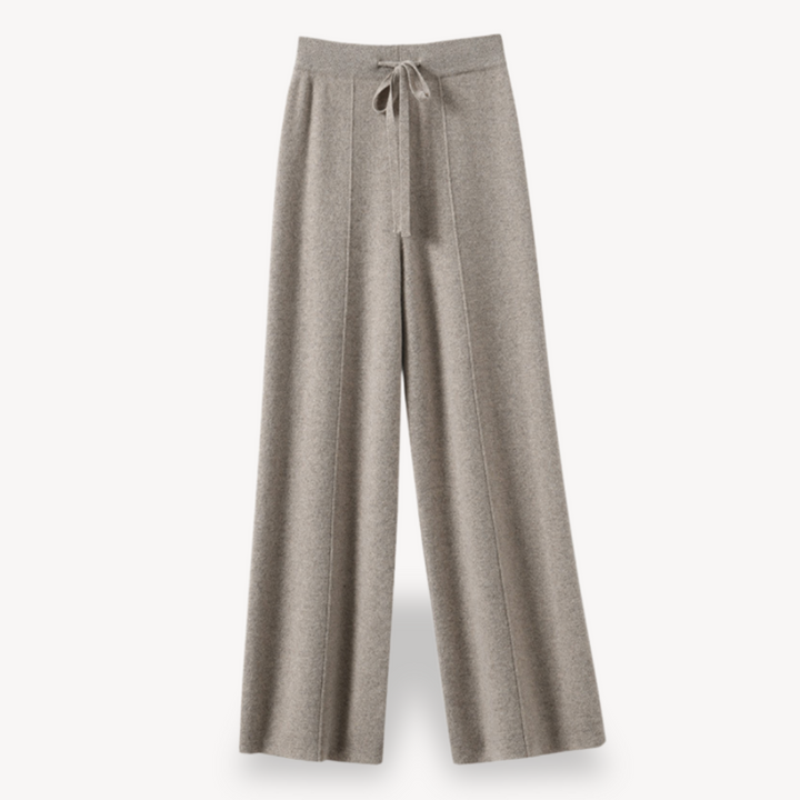 Beige cashmere wide-leg pants for women, offering comfort and style with a relaxed fit and drawstring adjustable waist.