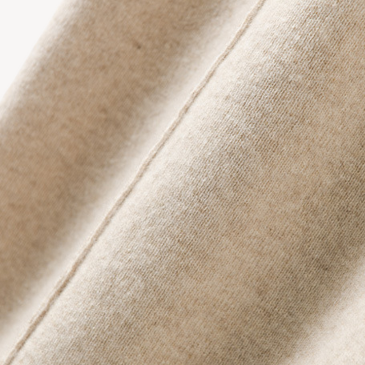 Beige cashmere wide-leg pants for women, offering comfort and style with a relaxed fit and drawstring adjustable waist.