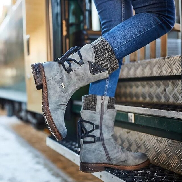 Comfortable Bianca mid-calf snow boots for women, offering warmth & protection in winter's cold.
