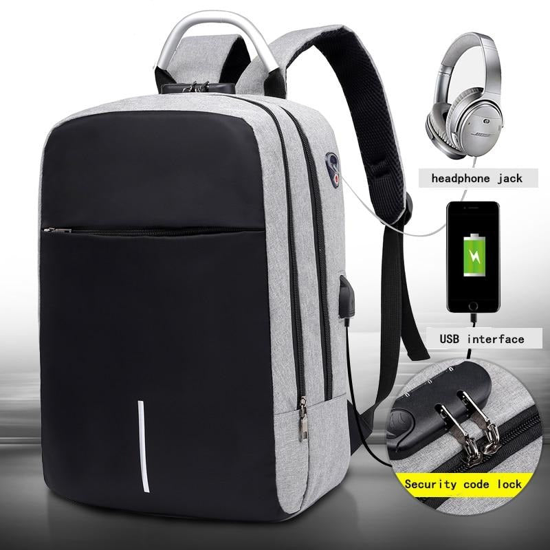 Water-resistant unisex laptop backpack, grey, with integrated USB charging port for travel & commuting.