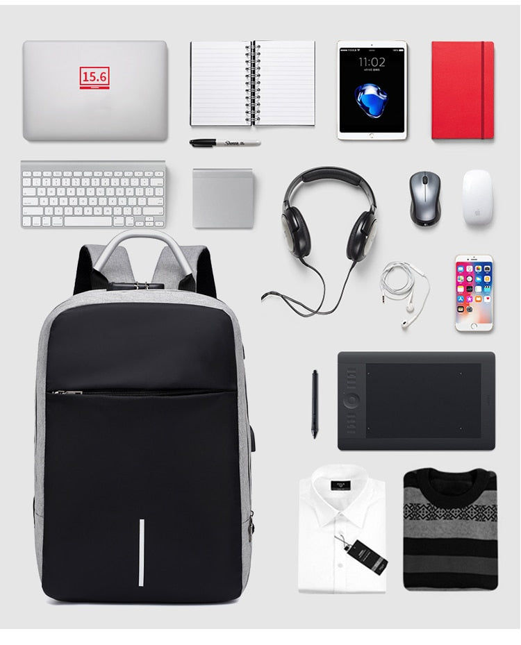 Ergonomic anti-theft backpack for laptops, grey, with comfortable straps & back panel for daily commute.