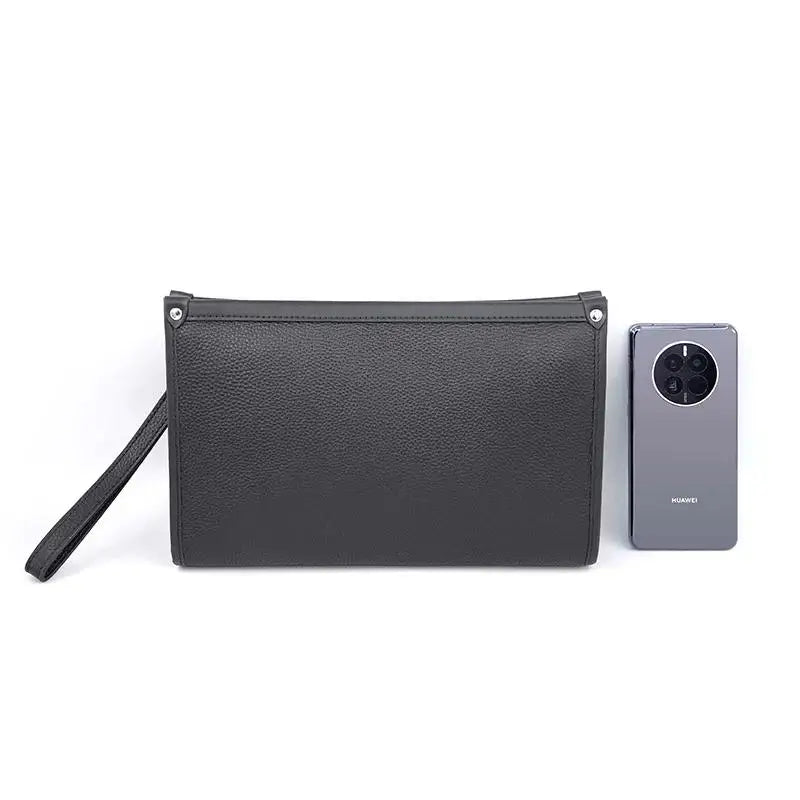 Secure black genuine leather men's travel clutch bag, featuring a high-tech fingerprint lock for ultimate peace of mind.