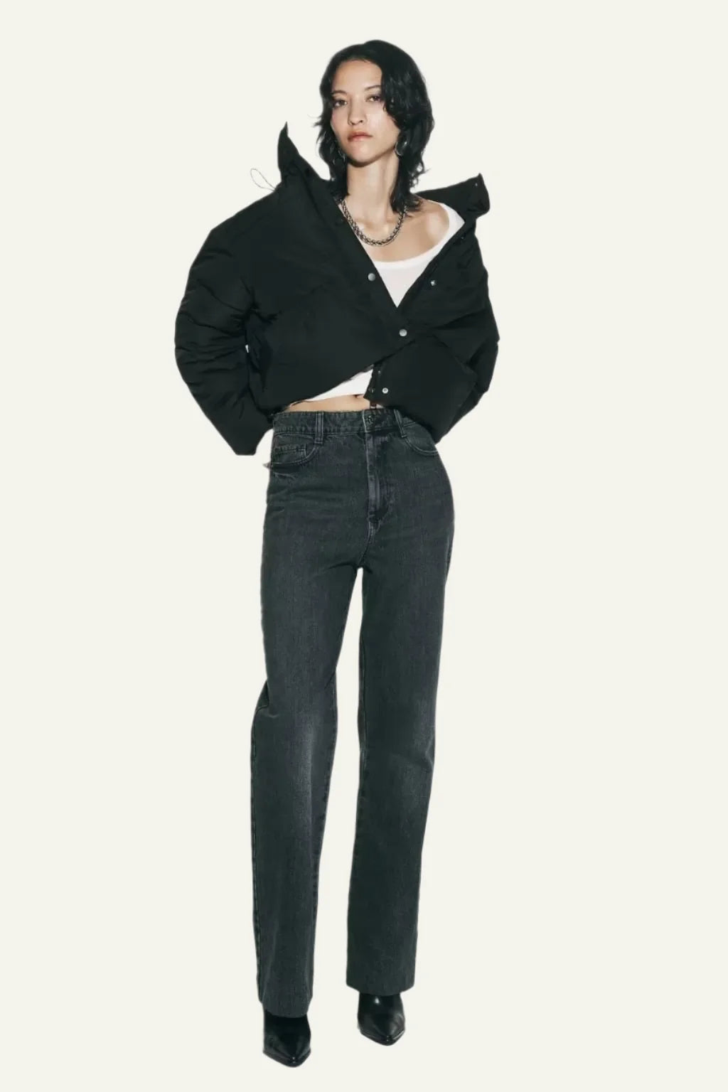 Cozy insulated black women's puffer jacket. Lightweight warmth, perfect winter coat for cold weather.