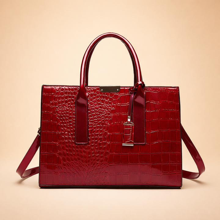 Black sophisticated women's tote bag with structured design & crocodile pattern. Luxury fashion accessory for work or daily carry.