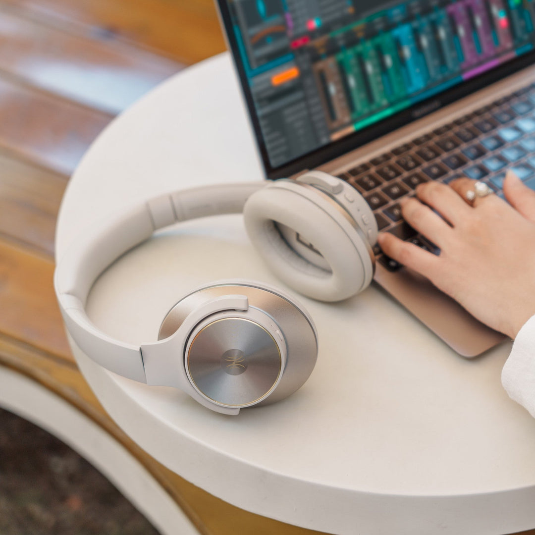 Black wireless over-ear headphones with Bluetooth and hybrid active noise cancellation, featuring memory foam earcups and USB